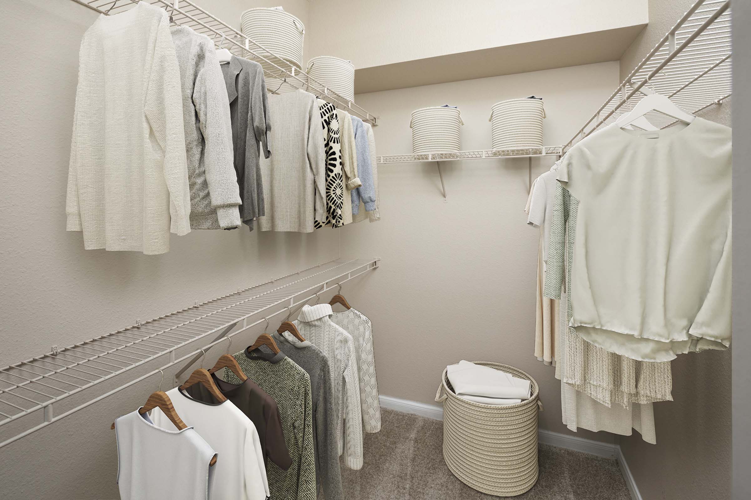 Walk in closet with built-in wire shelves at Camden Buckingham apartments in Richardson, Tx 