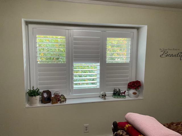 We're obsessed with these classic and romantic Plantation Shutters in this room in Ossining, NY - they evoke a timeless style that looks at home in any window! #BudgetBlindsOssining #PlantationShutters #OssiningNY #FreeConsultation