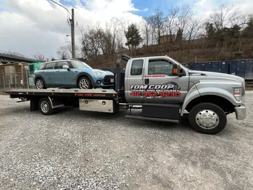 Images Tom Coop LLC Towing and Recovery