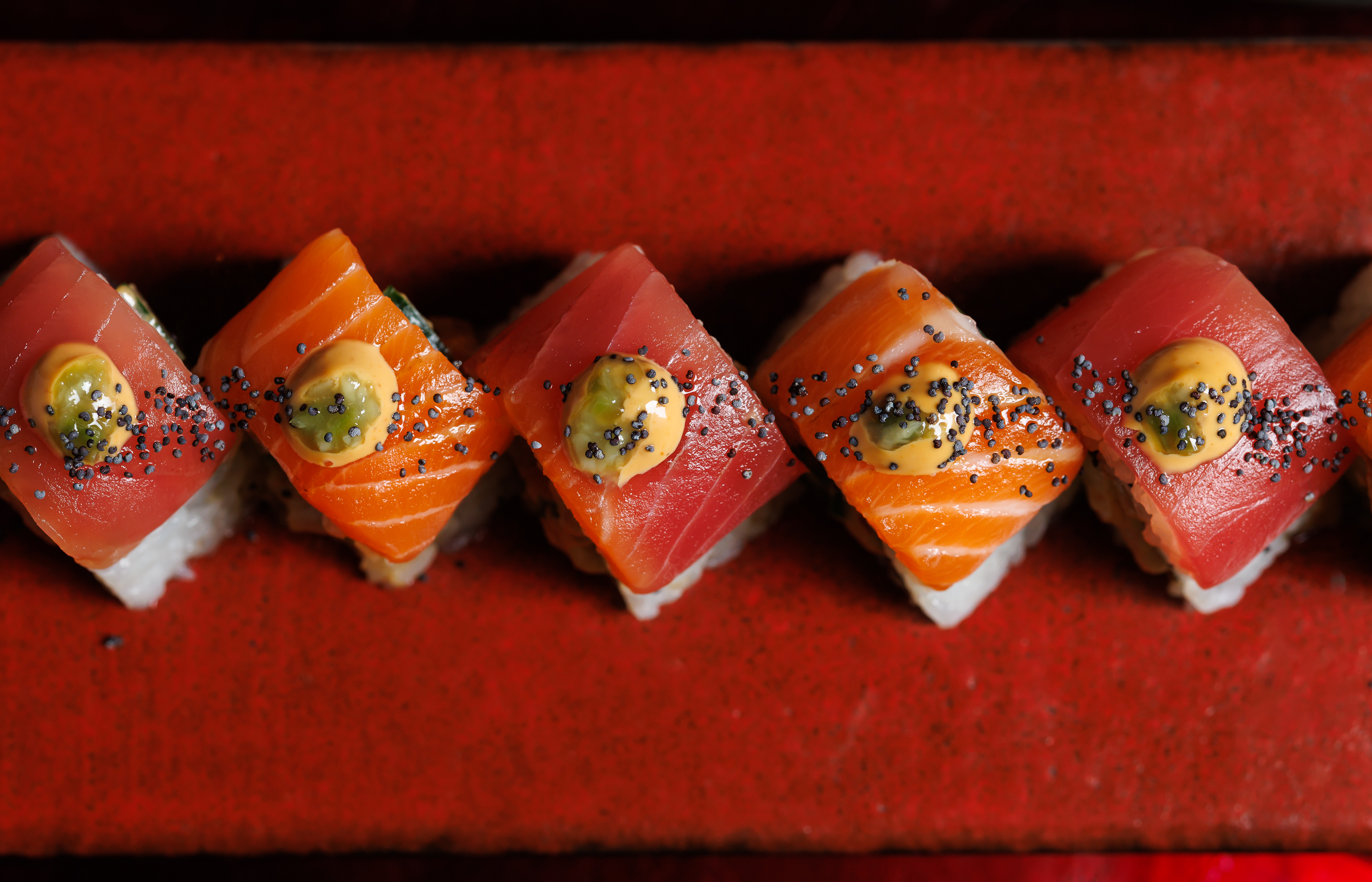 Discover the Yin Yang sushi roll at Mr. H in Boston’s Seaport District, featuring fresh salmon, tuna 