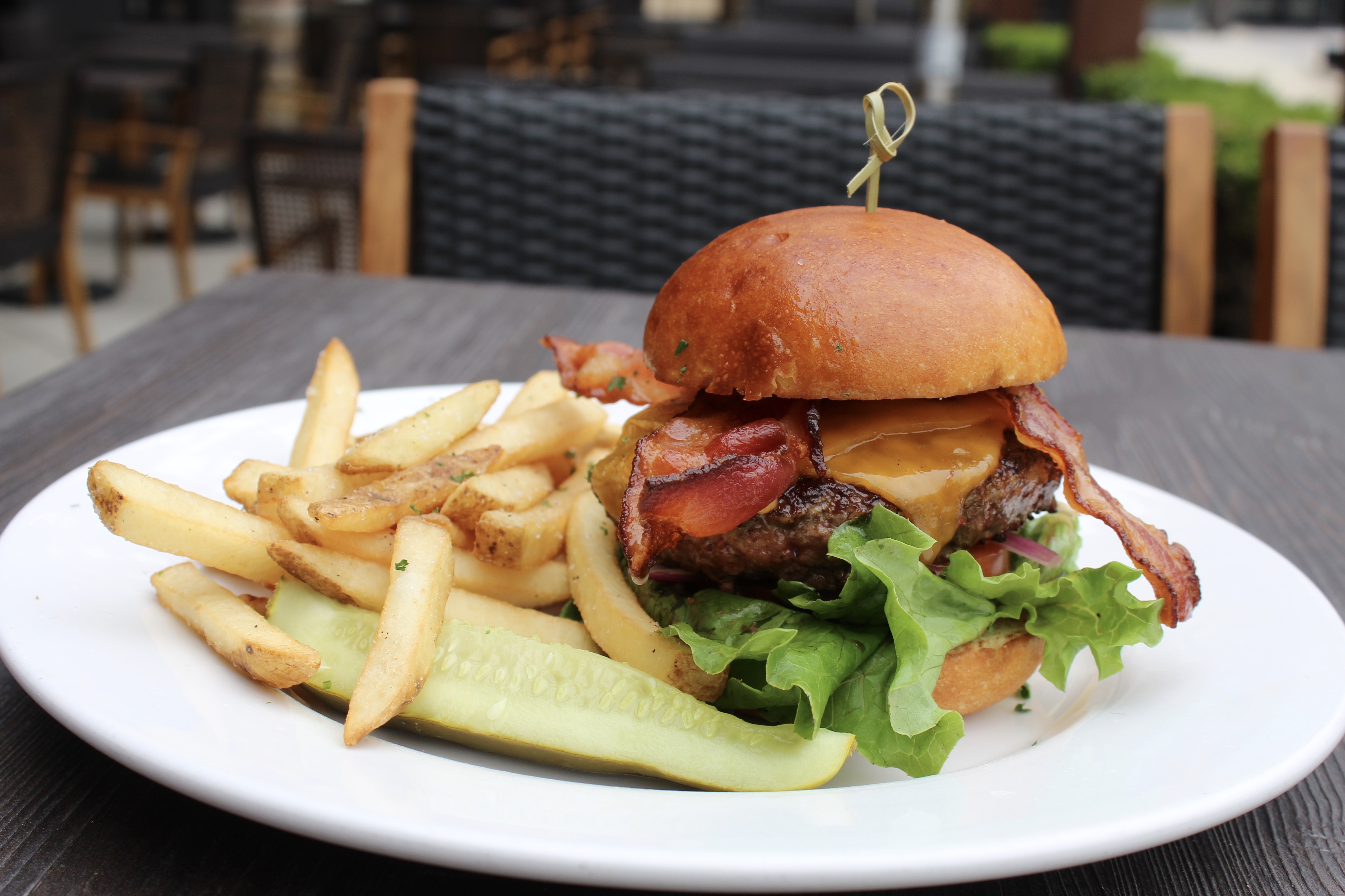 1/2lb Houseblend Burger made your way on brioche, served with fries & pickle 