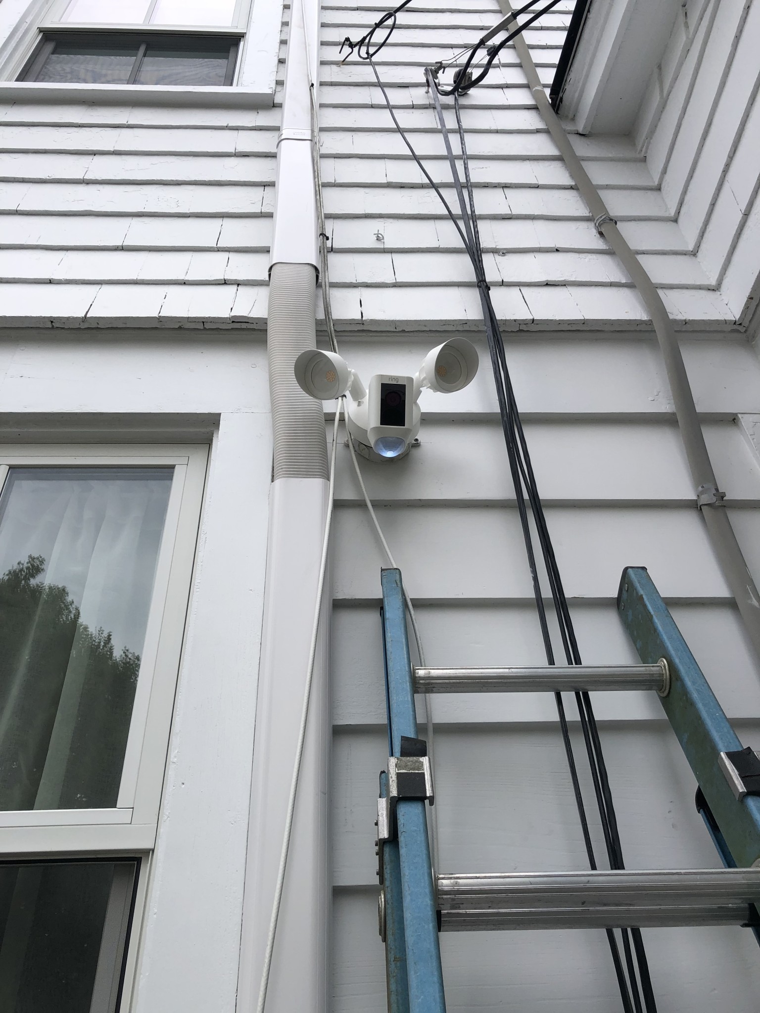 Installed a Ring Floodlight with a built-in camera and motion sensor.