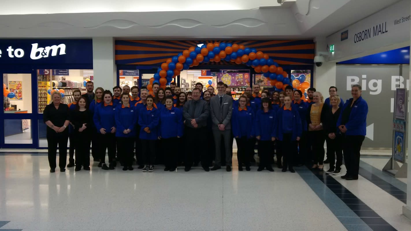 The store team at the latest B&M store at Thackeray Mall, Fareham pose outside the new Bargains Store.