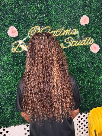 Images Fatima Braiding Studio