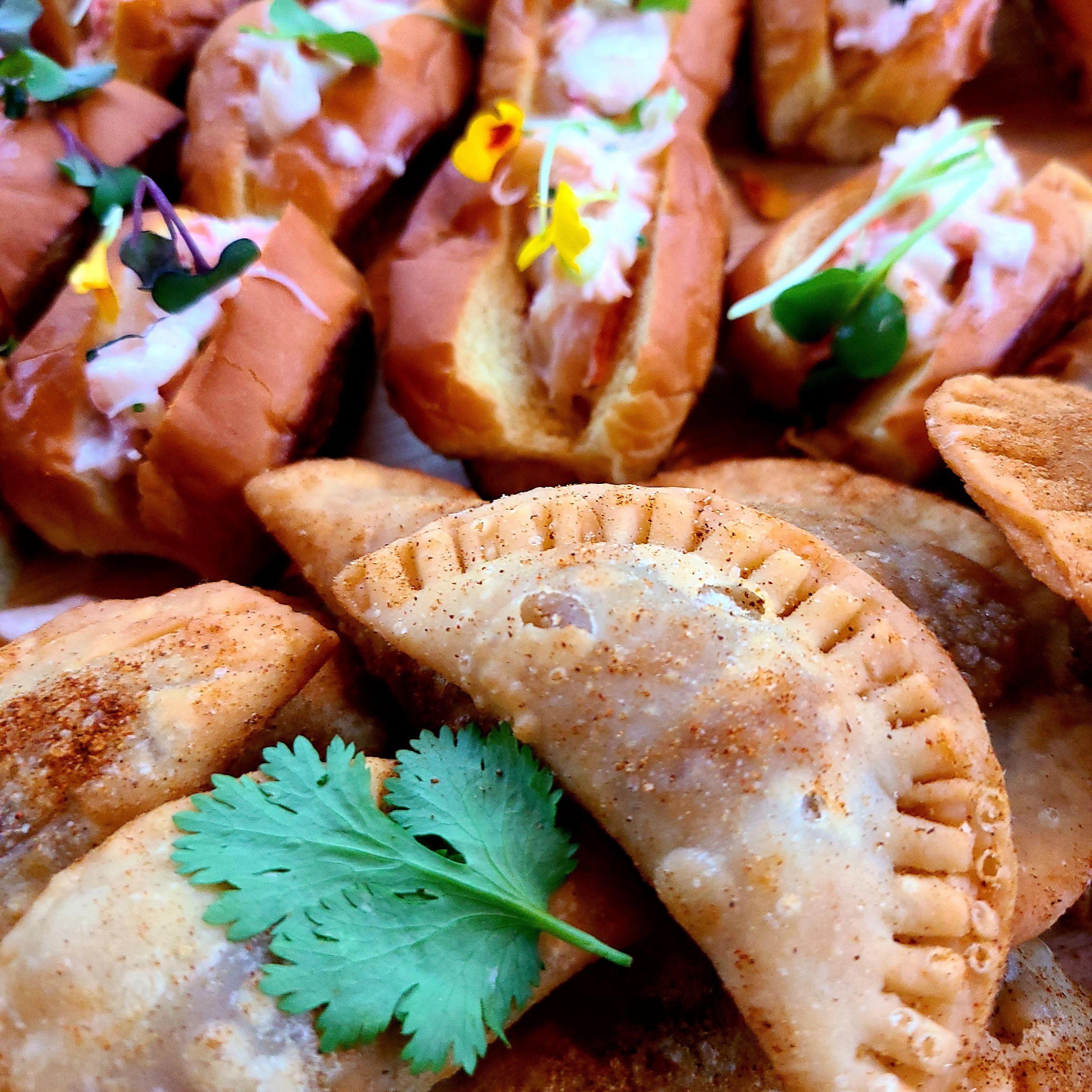 Flagler Tavern offers private event space with a full catering menu like these mini beef empanadas or mini lobster rolls