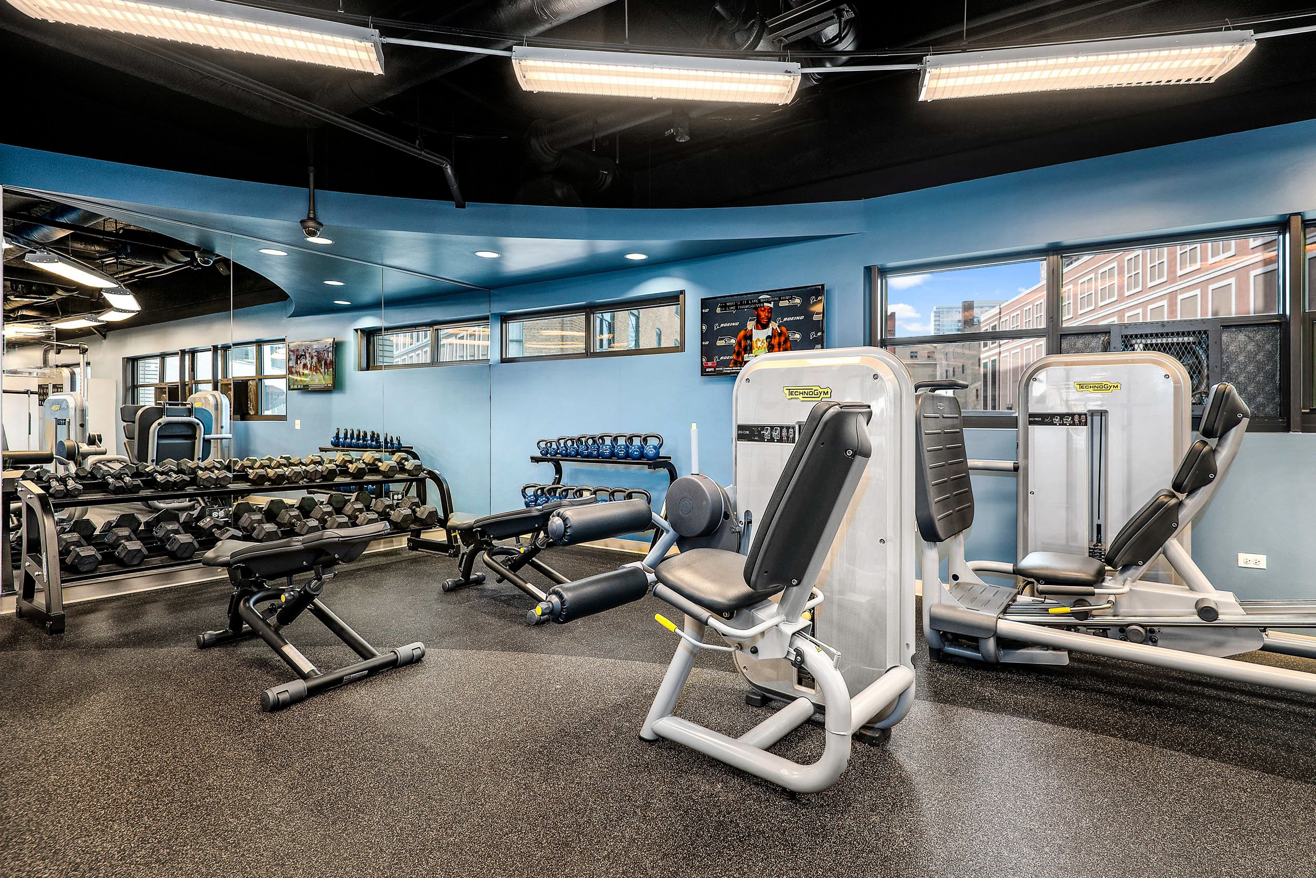 Fitness center with cardio and resistance machines 