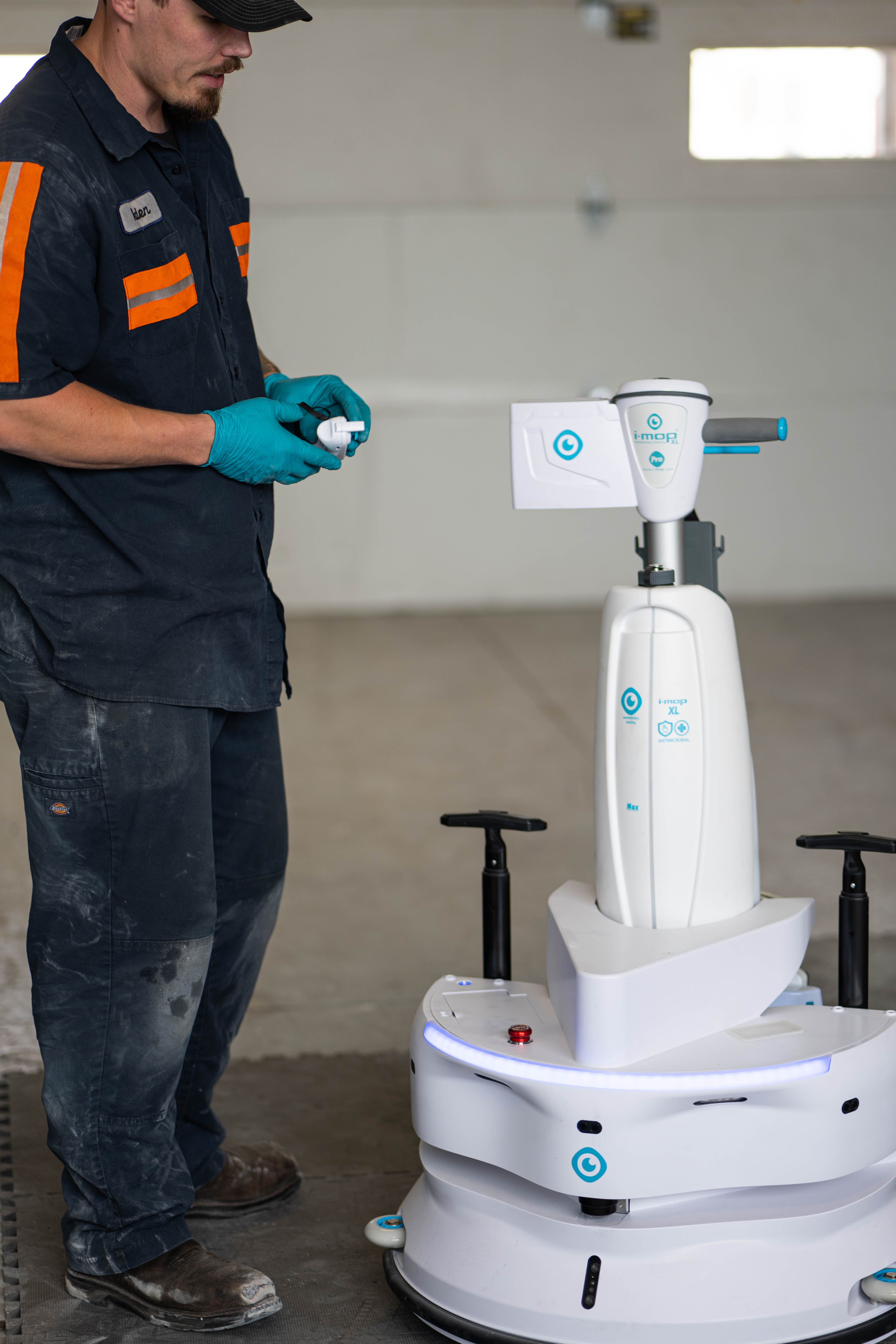 WaySolutions lead technician Kaden inspects the advanced controls of a high-tech i-mop XL autonomous robotic floor scrubber. As commercial cleaning embraces smart technology, our specialized repair facility in Layton, Utah, provides the precision firmware calibration and diagnostic expertise required to keep next-generation robotic fleets operating flawlessly.