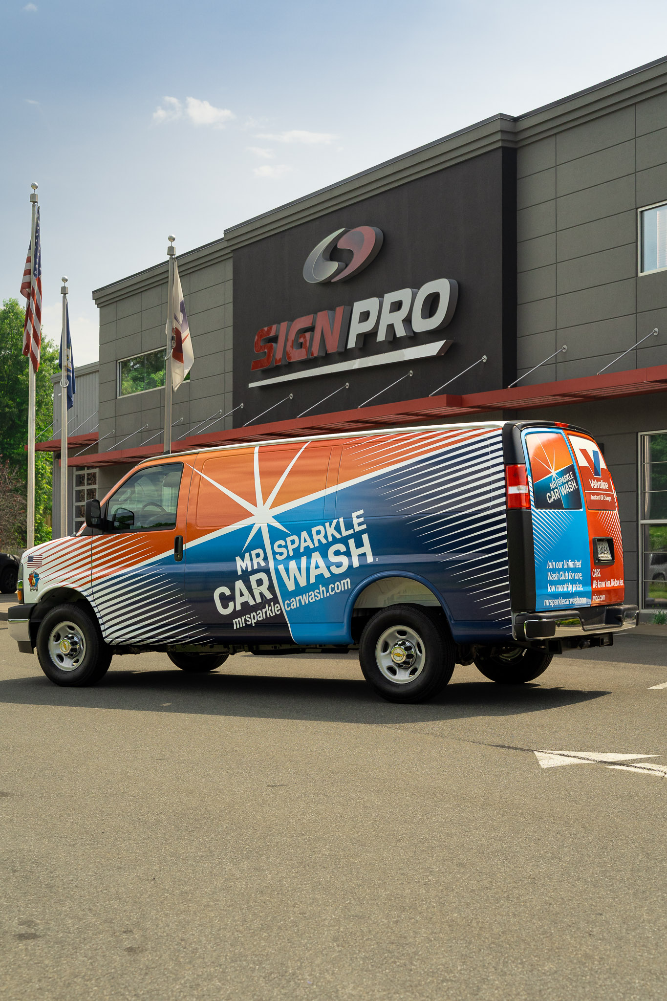 Full vehicle wrap designed, produced, and installed by Sign Pro for Mr. Sparkle Car Wash.