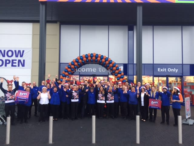 B&M Skelton store staff pose outside their brand new store, located on Pheasant Field Lane.