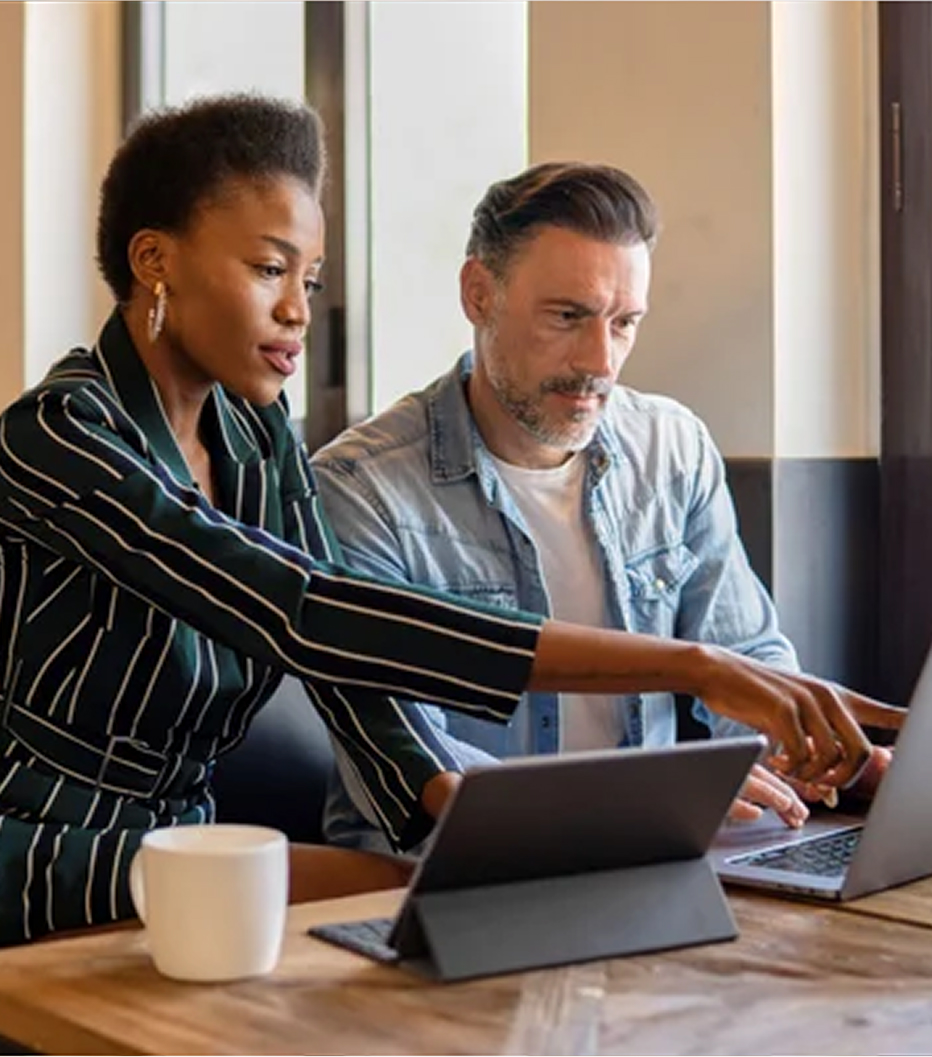 Image of a Financial Advisor sharing guidance to a customer via a laptop.