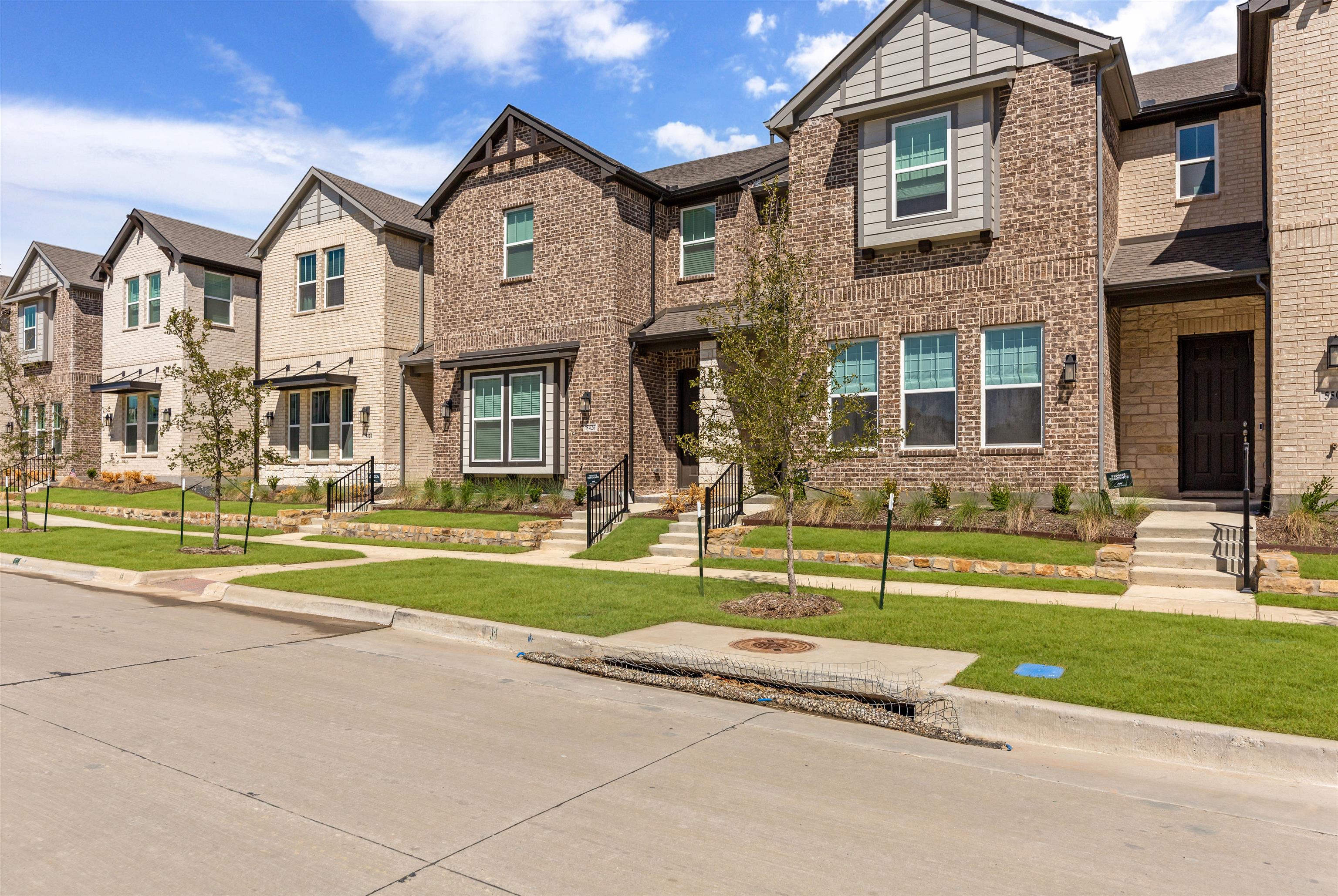 The  Station Townhomes by Ashton Woods in Sachse TX