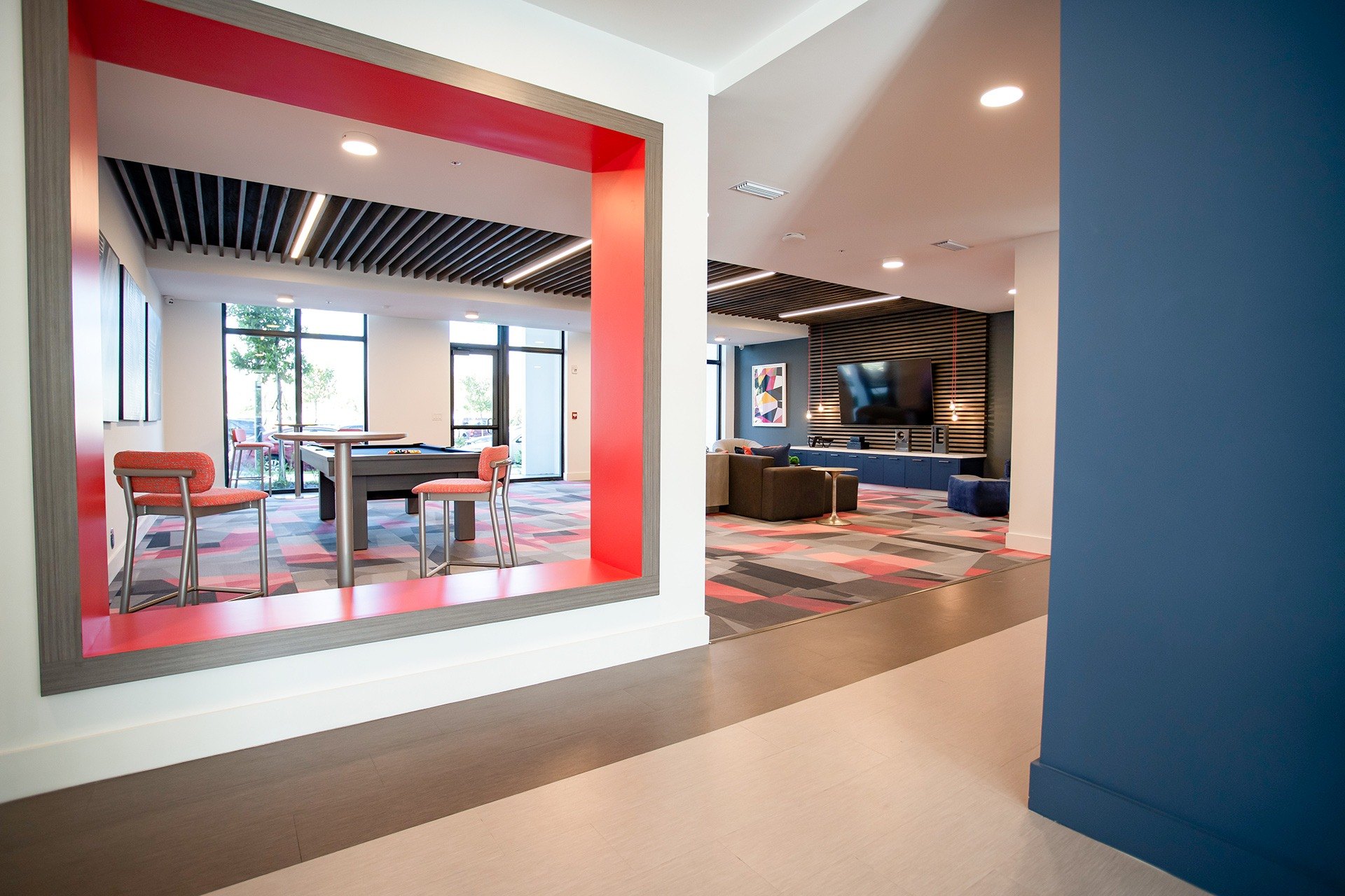 Community lounge with colorful accents and seating