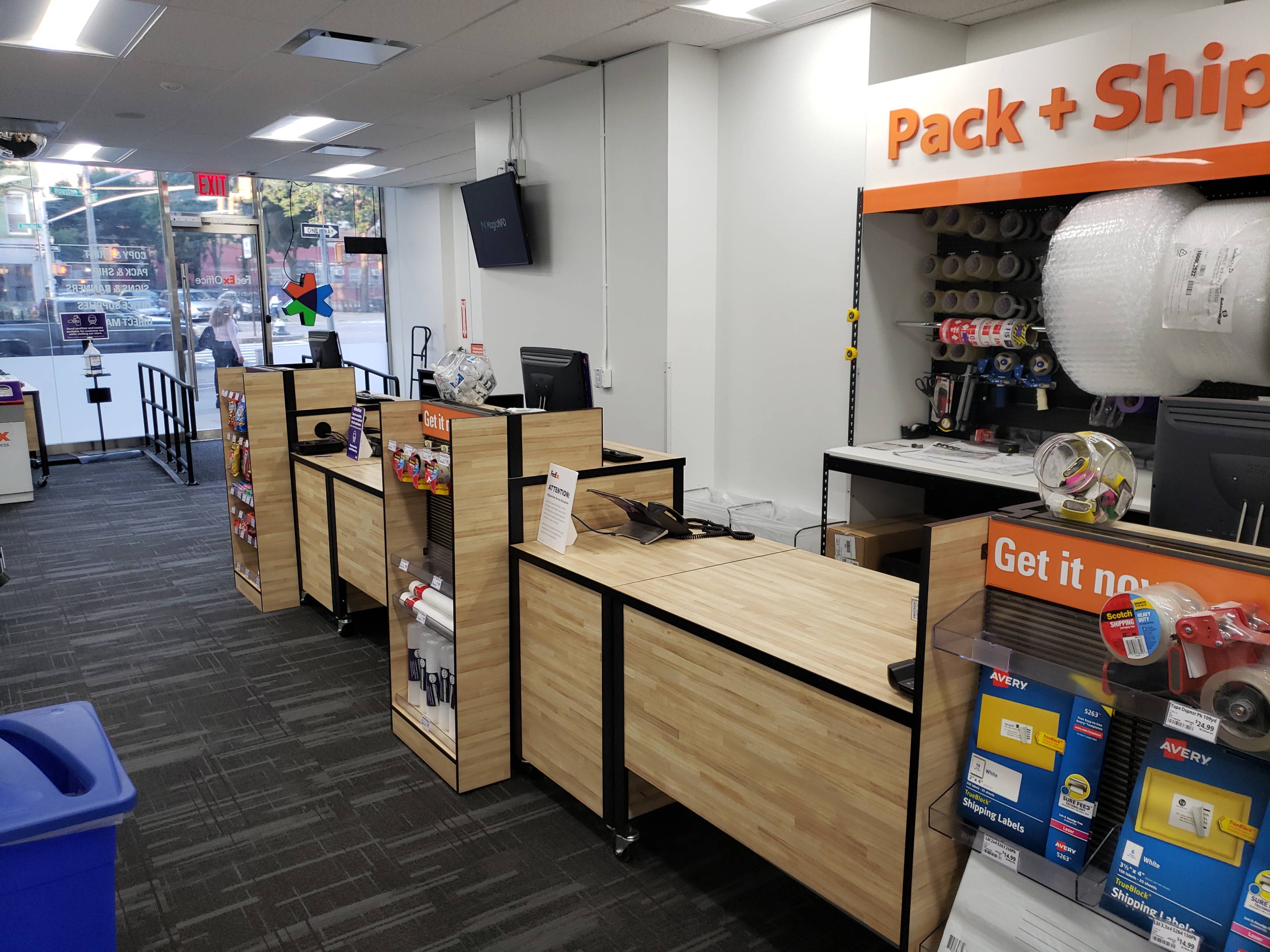 Pack and Ship Service Counters &ndash; Front counter area at FedEx Office East Village NYC offering packing services, shipping support, and customer assistance.