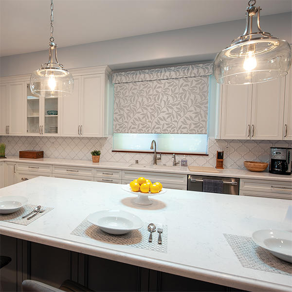 You can add pizazz and excitement to any space with the right patterns. Luckily, roller shades come in a ton of unique patterns to perfectly accommodate your style. These patterned shades provide a visual statement while blending cohesively with the color scheme of this kitchen.