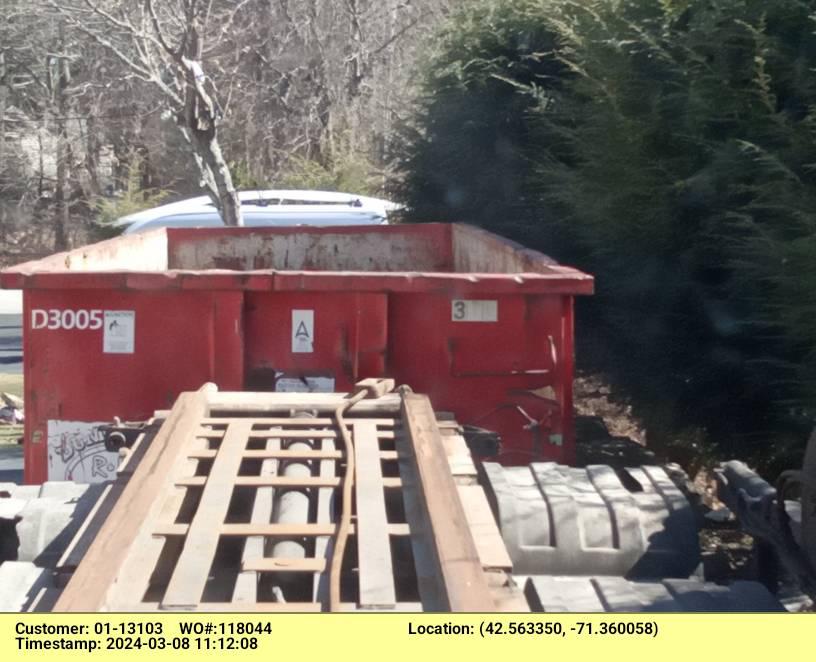 30 yard dumpster rental, with a 4 ton weight limit, delivered in Chelmsford, MA for a construction project.