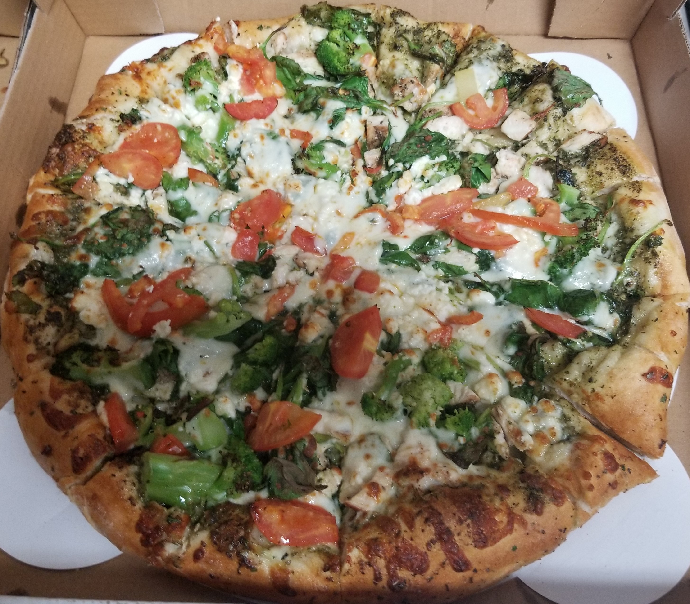 Fan Creation! A classic pesto chicken pizza with fresh sliced tomatoes and broccoli!