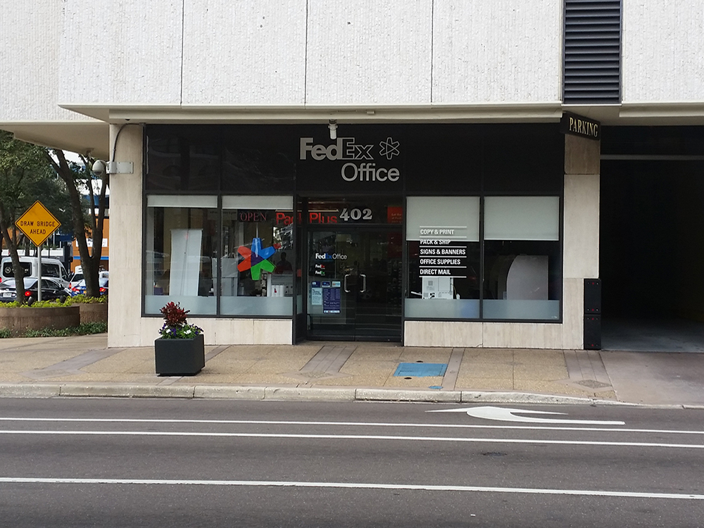 Exterior photo of FedEx Office location at 400 N Tampa St\t Print quickly and easily in the self-ser FedEx Office Print & Ship Center Tampa (813)225-2523