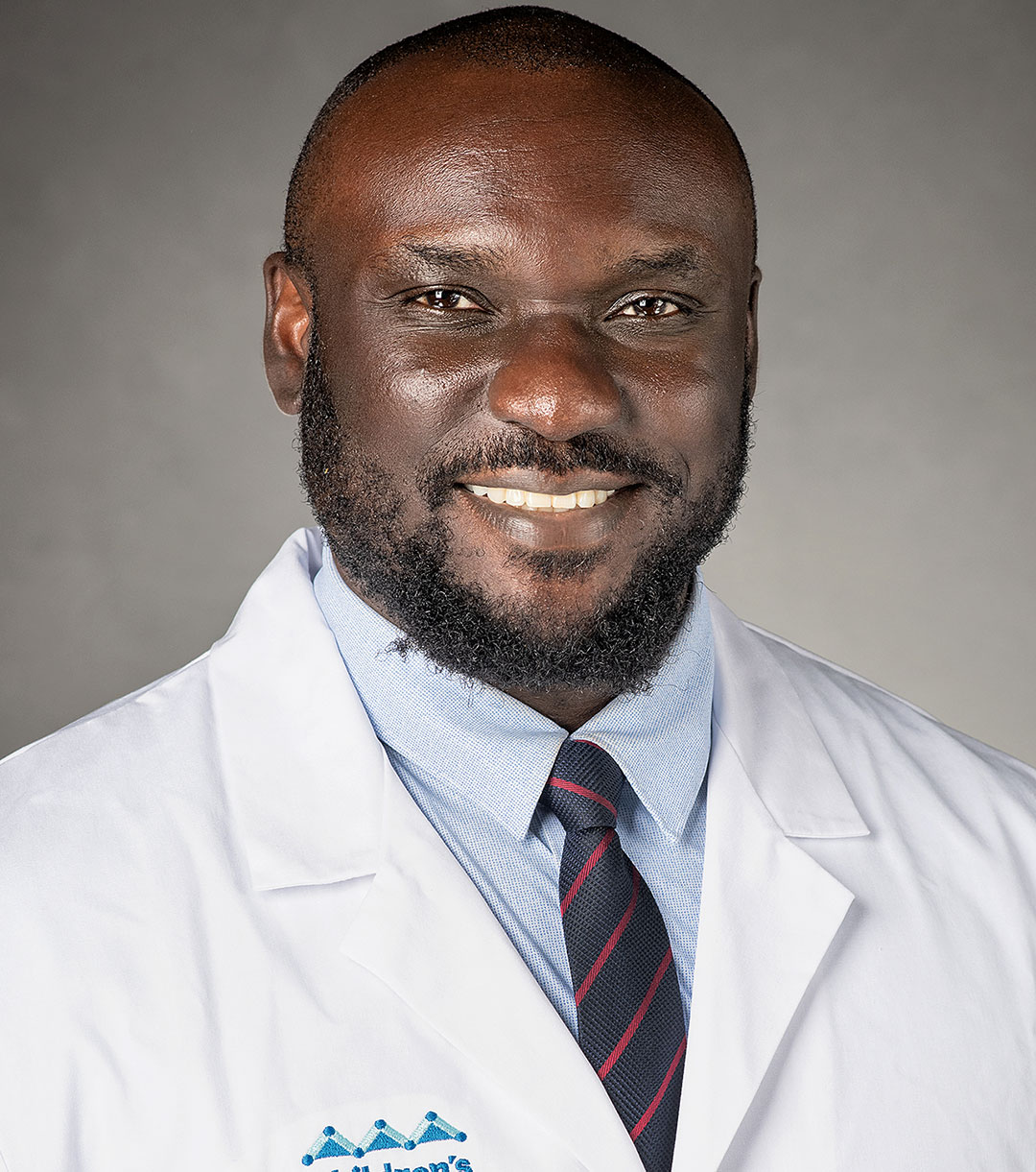 Headshot of Dr. 	 Patrick Fueta