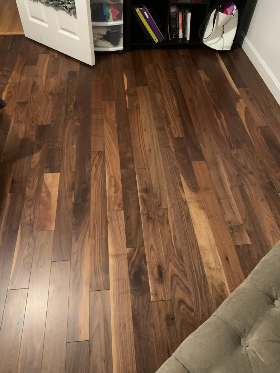 For this job in Danville, NH, our Handyman removed the existing carpeting and replaced it with beautiful Mirage wood flooring.