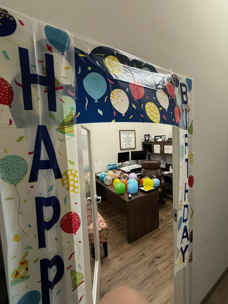 Our team went all out to surprise John for his birthday! The office entrance was transformed with a Happy Birthday banner and festive balloon curtains from top to bottom.