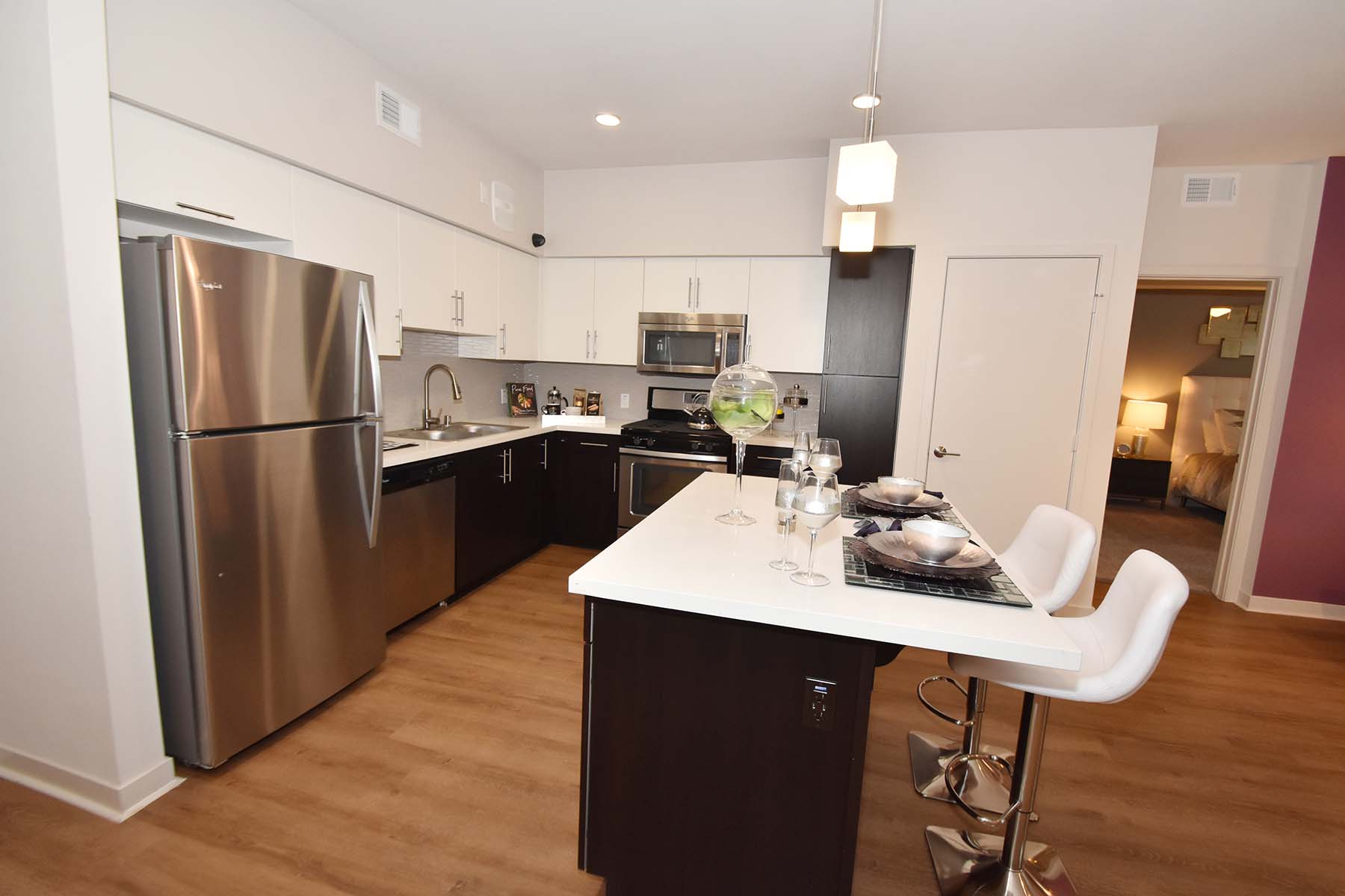 A modern kitchen with a dining table set