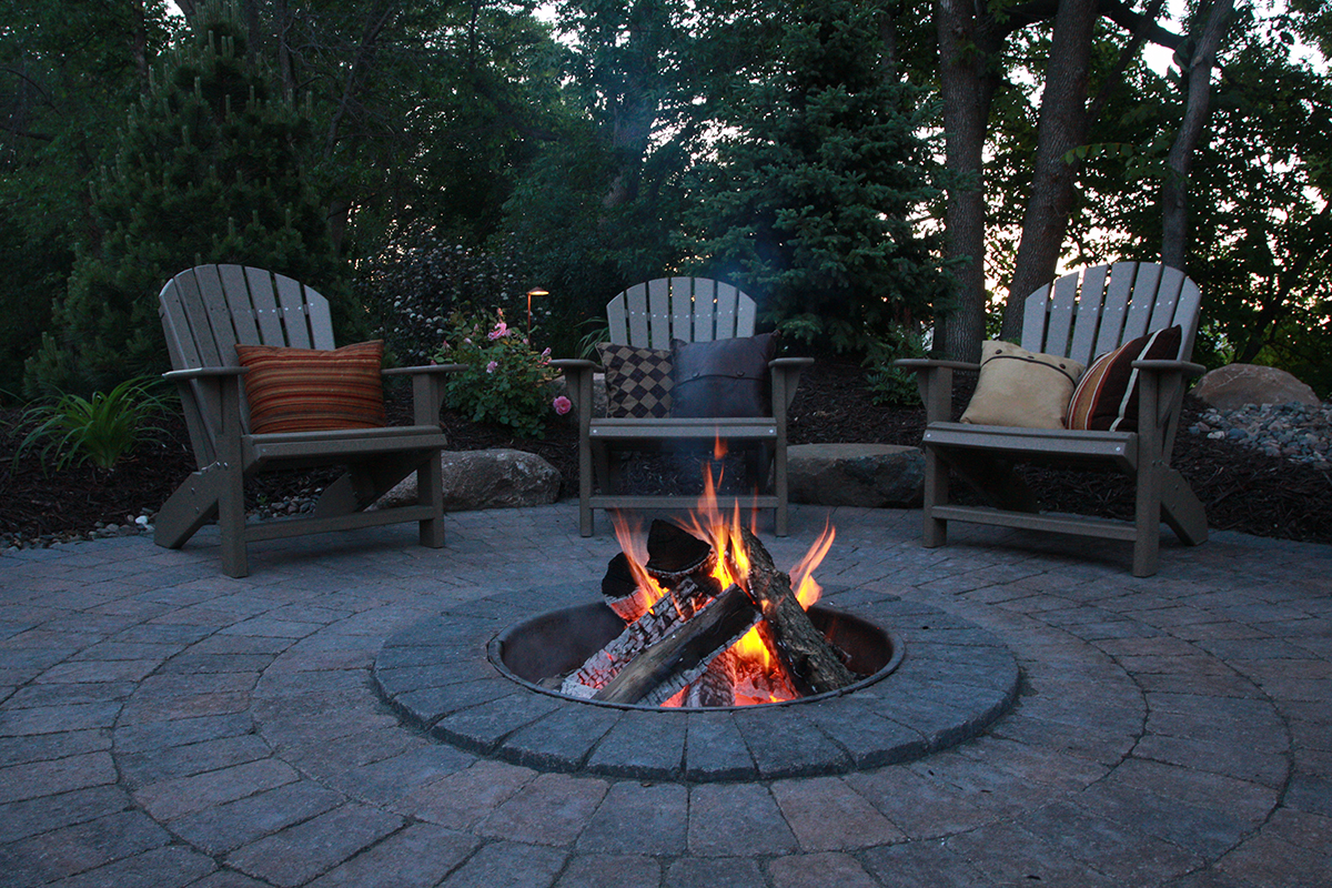 Firepit patios can be simple or a little more extravagant, but either way are a nice addition to any backyard!