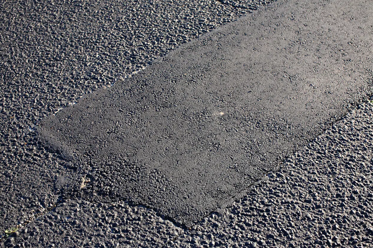 Professional asphalt repair services that restore damaged pavement and extend the life of roads, parking lots, and driveways. We repair potholes, cracks, utility cuts, and worn pavement using high-quality asphalt materials and proven repair techniques. Our solutions improve safety, prevent water infiltration, and enhance the appearance of your pavement while minimizing future maintenance costs and preserving your property's long-term value.