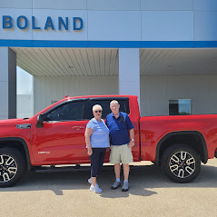 Red truck in front of Boland Chevrolet