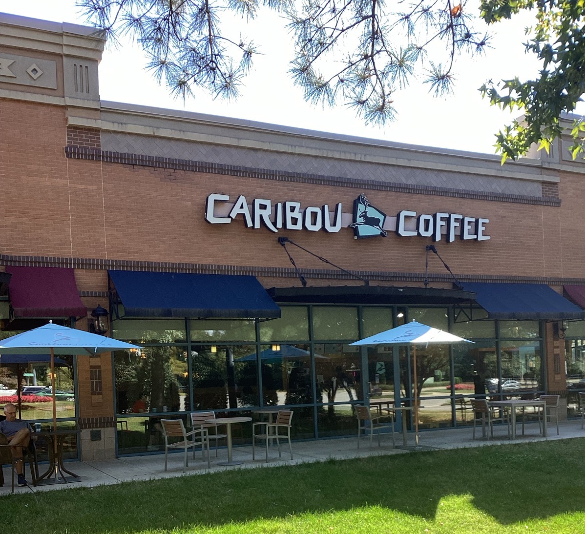 Storefront of the Caribou Coffee at 8201 Brier Creek Parkway in Raleigh