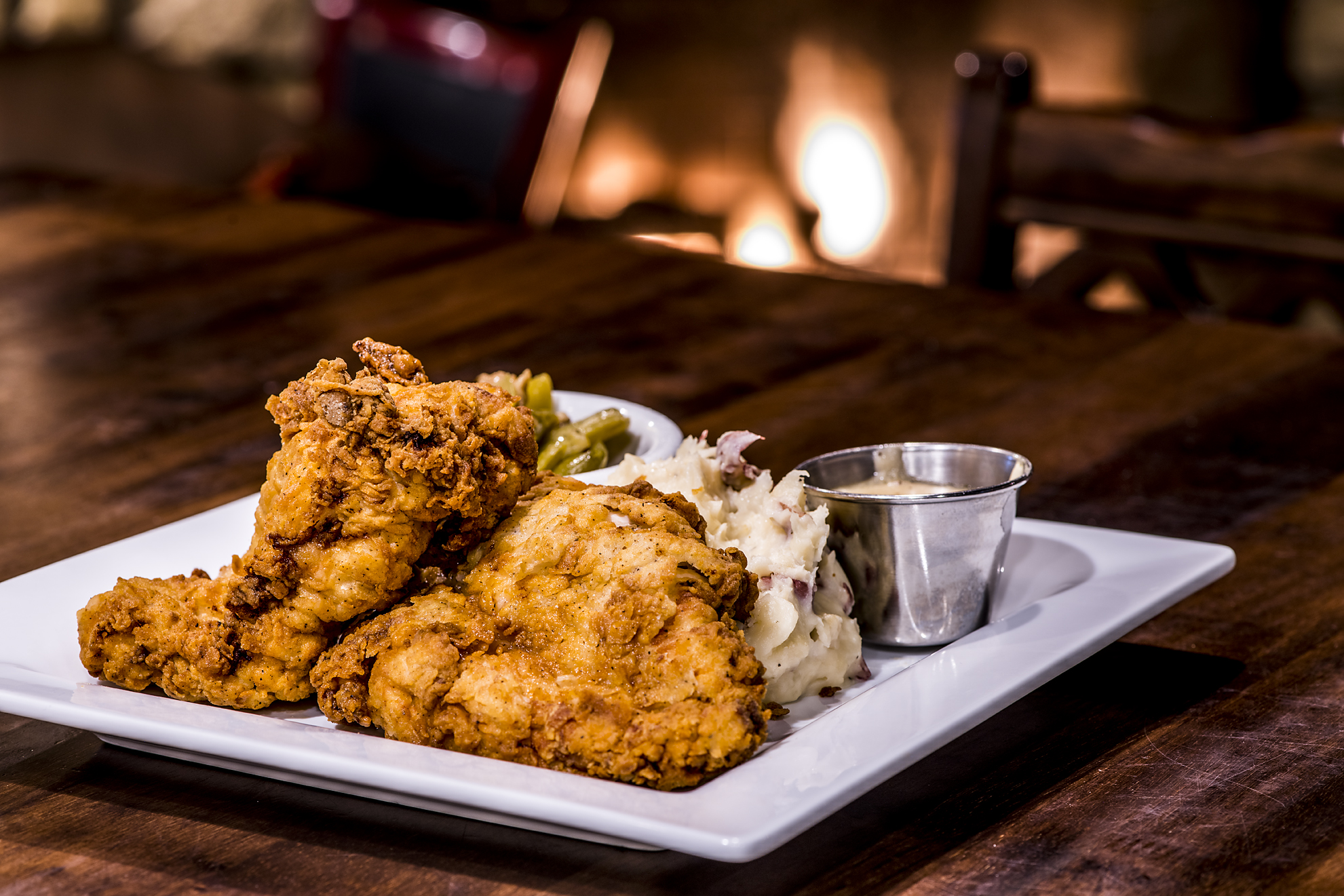 Buttermilk Fried Chicken: mashed red potatoes, country green beans, bacon pan gravy