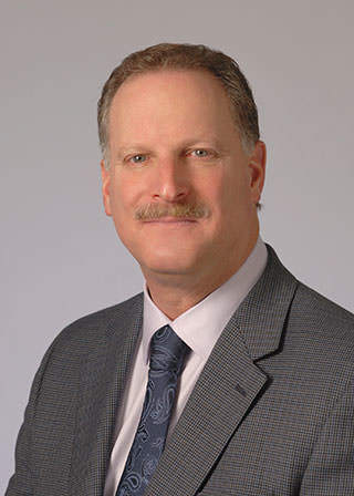 Jeffrey A Breall