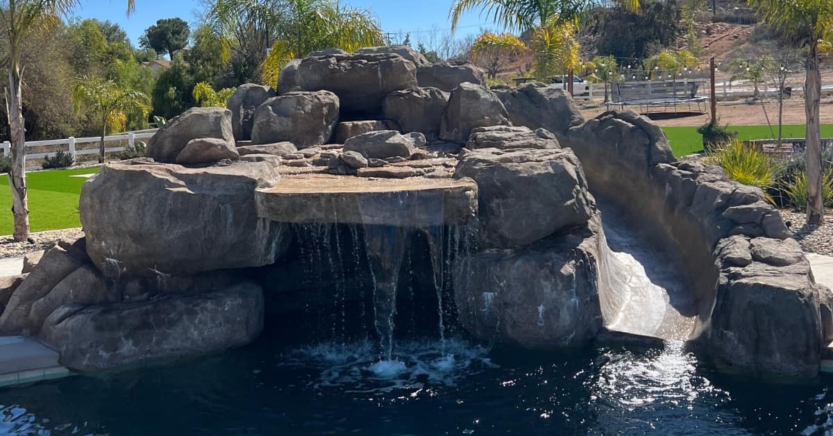 Natural Rock Grotto, Waterfall and Slide, Click to learn more.