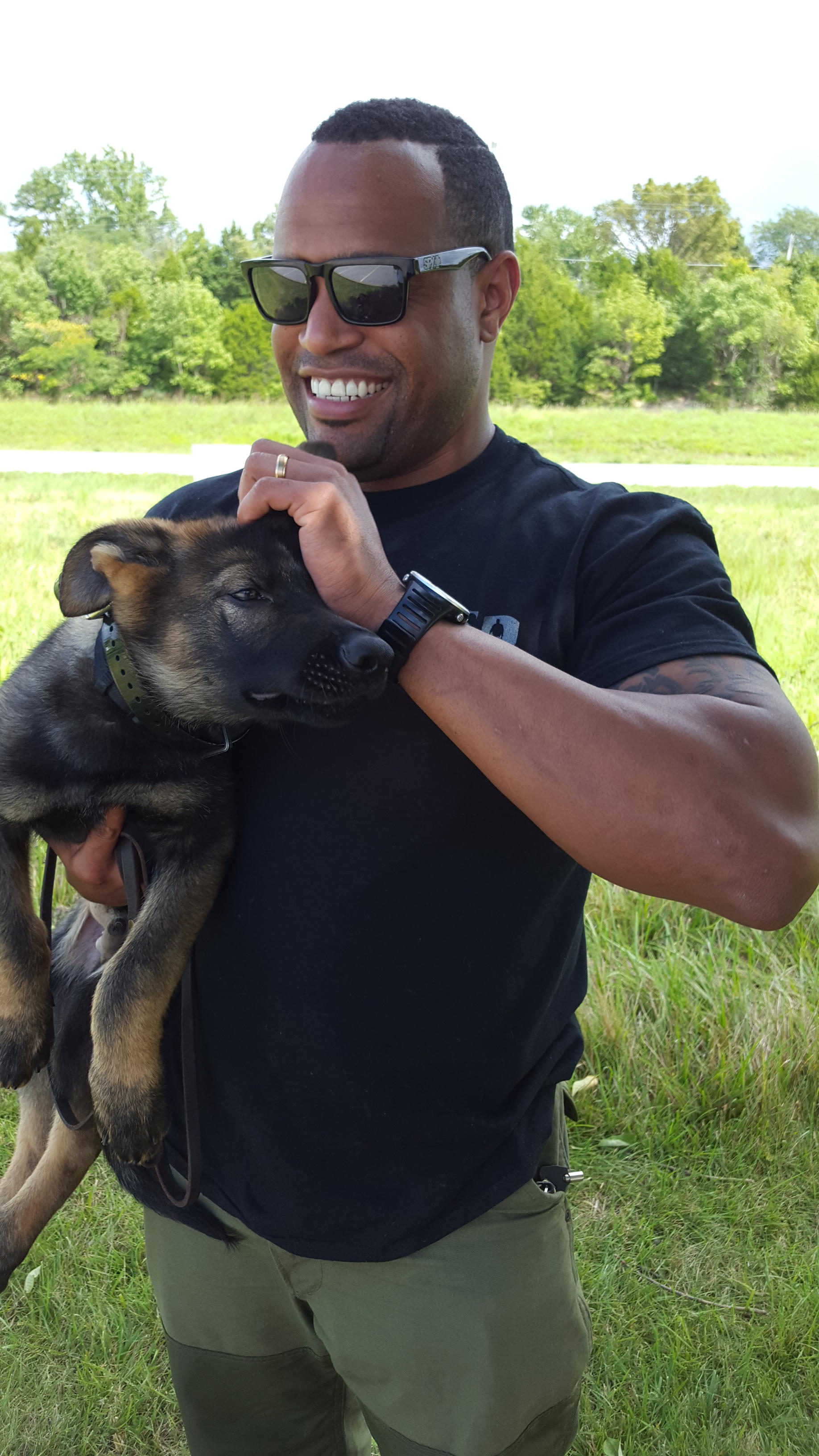 Dog trainer with puppy