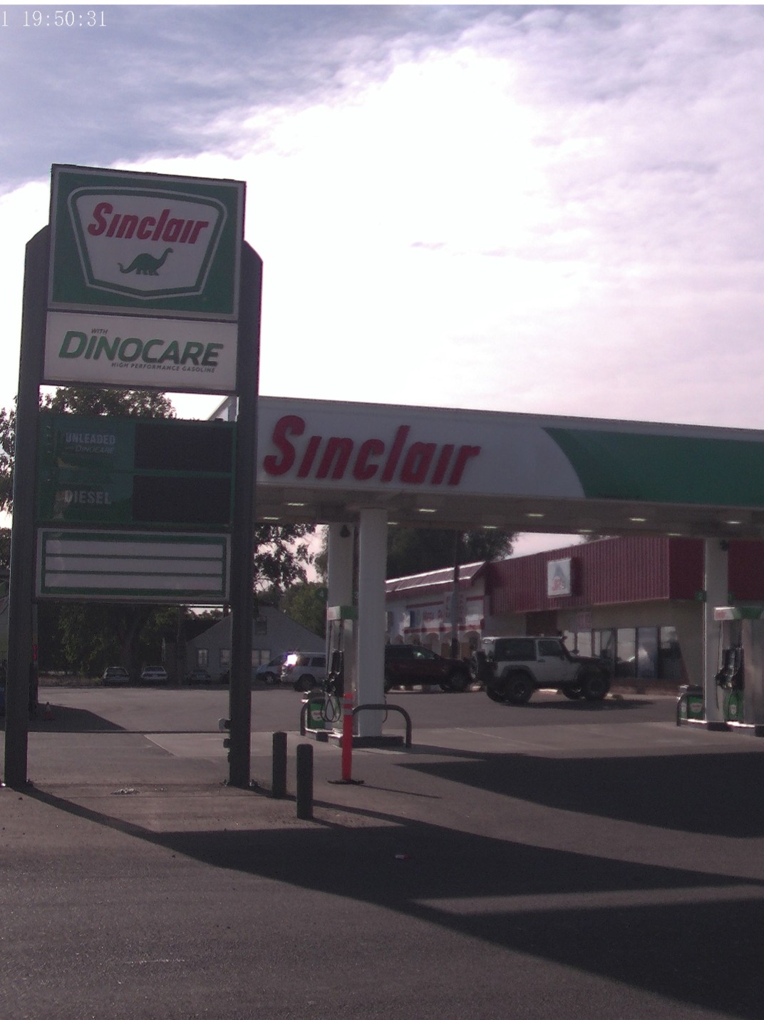 Sinclair gas station fueling island