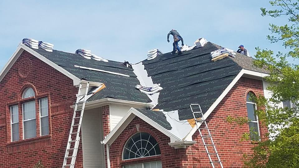 Springtree Restoration Roofing Team is in action on the work-in-progress project.