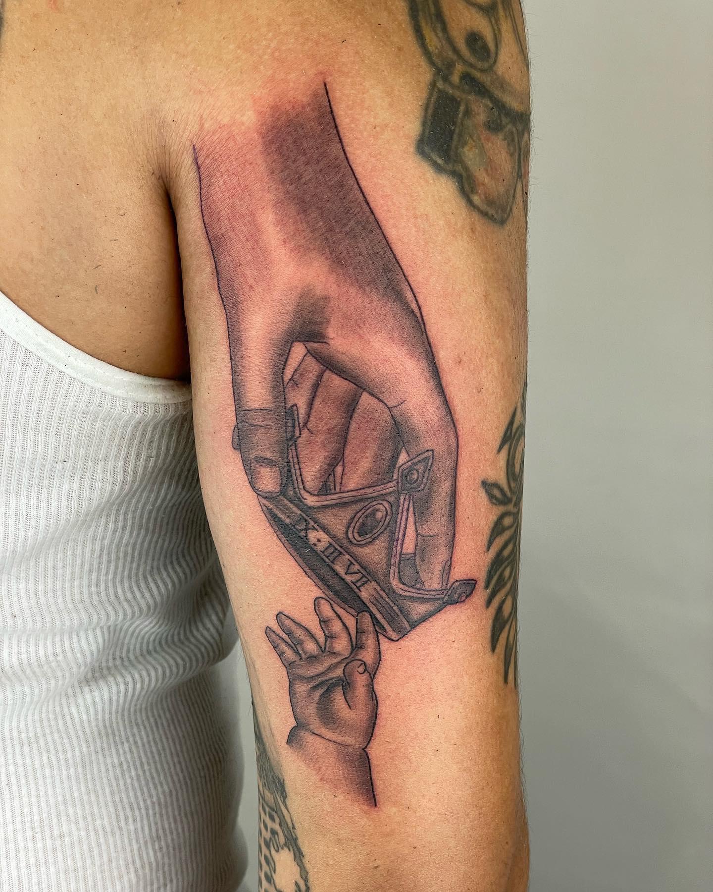 Spoken Hand Tattoo