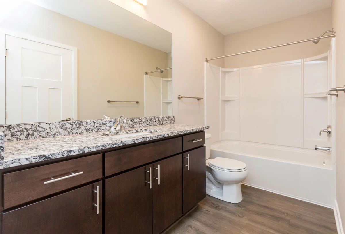 Bathroom with large mirror