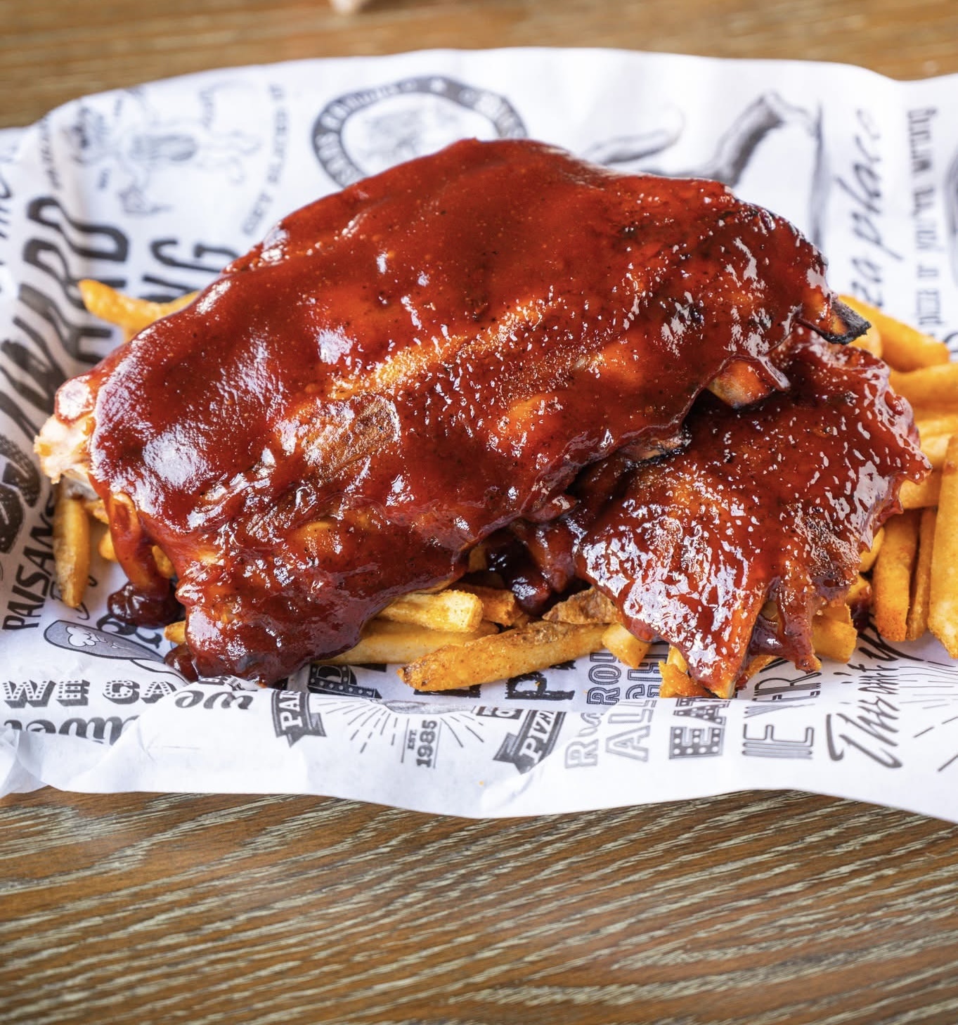 Slow Roasted to perfection | BBQ sauce | Served on Crispy French Fries 