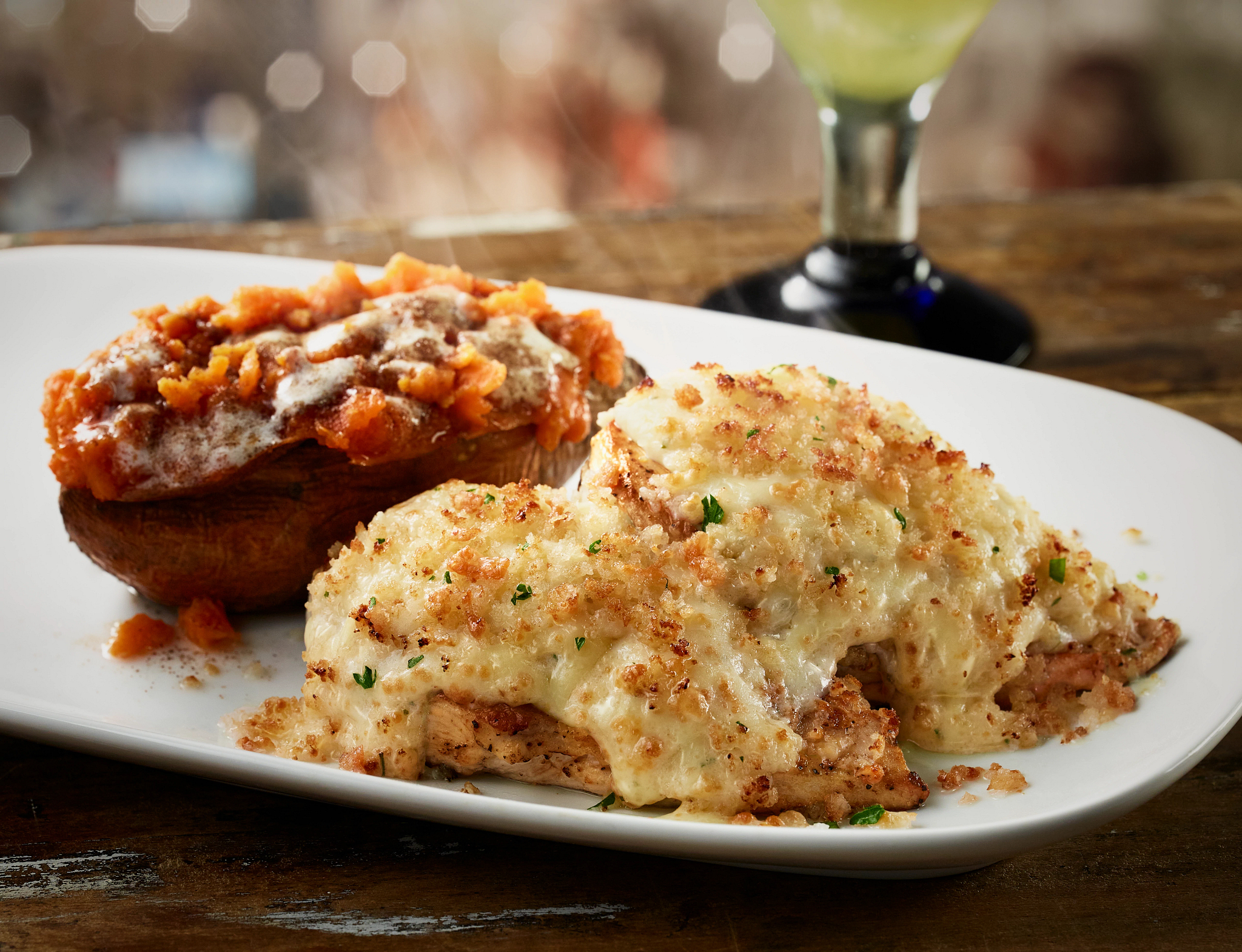 Order our Parmesan Crusted Chicken made with grilled chicken topped with a creamy Parmesan and garlic cheese crust.