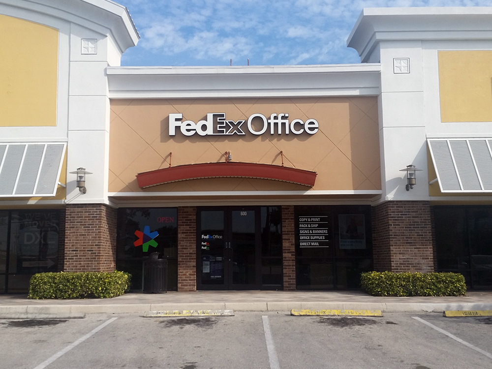 Exterior photo of FedEx Office location at 2301 Glades Rd\t Print quickly and easily in the self-service area at the FedEx Office location 2301 Glades Rd from email, USB, or the cloud\t FedEx Office Print & Go near 2301 Glades Rd\t Shipping boxes and packing services available at FedEx Office 2301 Glades Rd\t Get banners, signs, posters and prints at FedEx Office 2301 Glades Rd\t Full service printing and packing at FedEx Office 2301 Glades Rd\t Drop off FedEx packages near 2301 Glades Rd\t FedEx shipping near 2301 Glades Rd