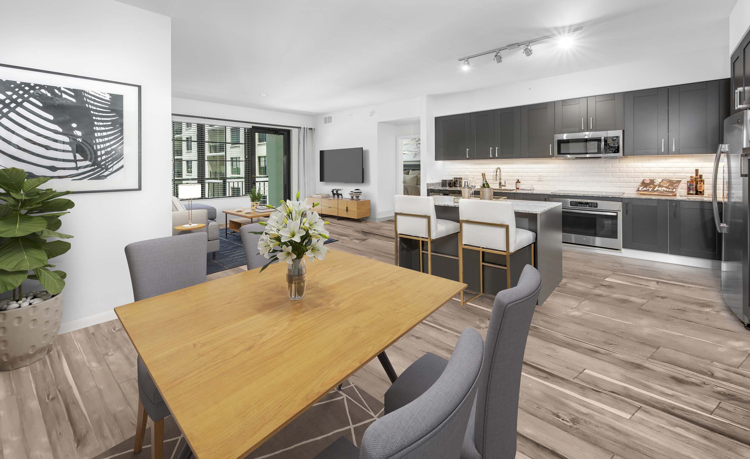 Designated dining area off the kitchen. Feeling creative? Use this space as your home office at Camden Central Apartments in St. Petersburg, FL.