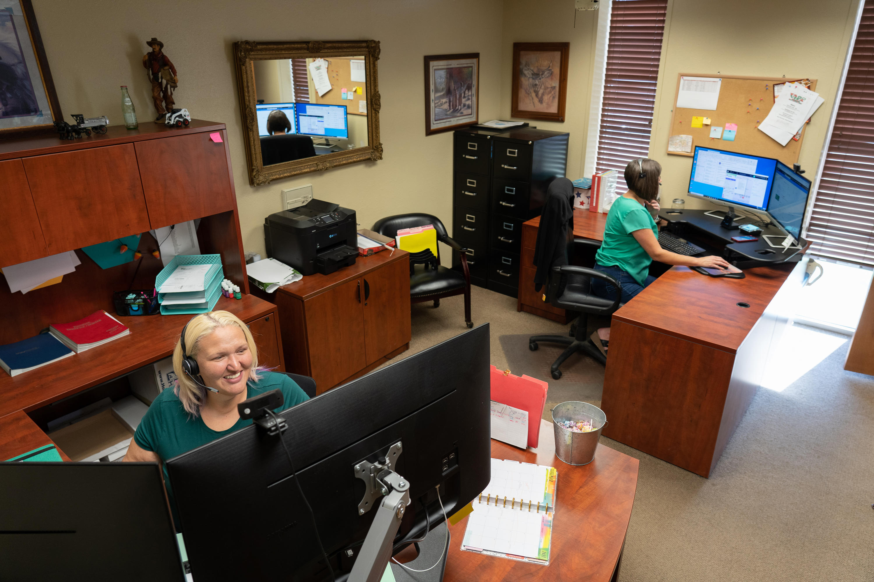 Some of the amazing office team at Tioga Contractors making sure the Electrical Services and plumbing service needs in Hurst, TX are met.