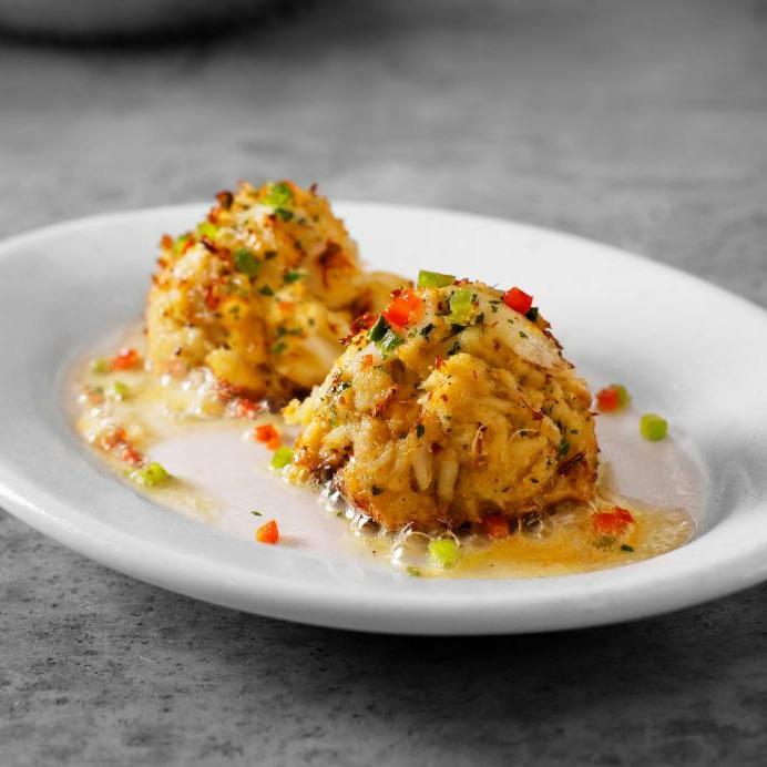 SIZZLING CRAB CAKES - two jumbo lump cakes, lemon butter Ruth's Chris Steak House Toronto (647)797-5400