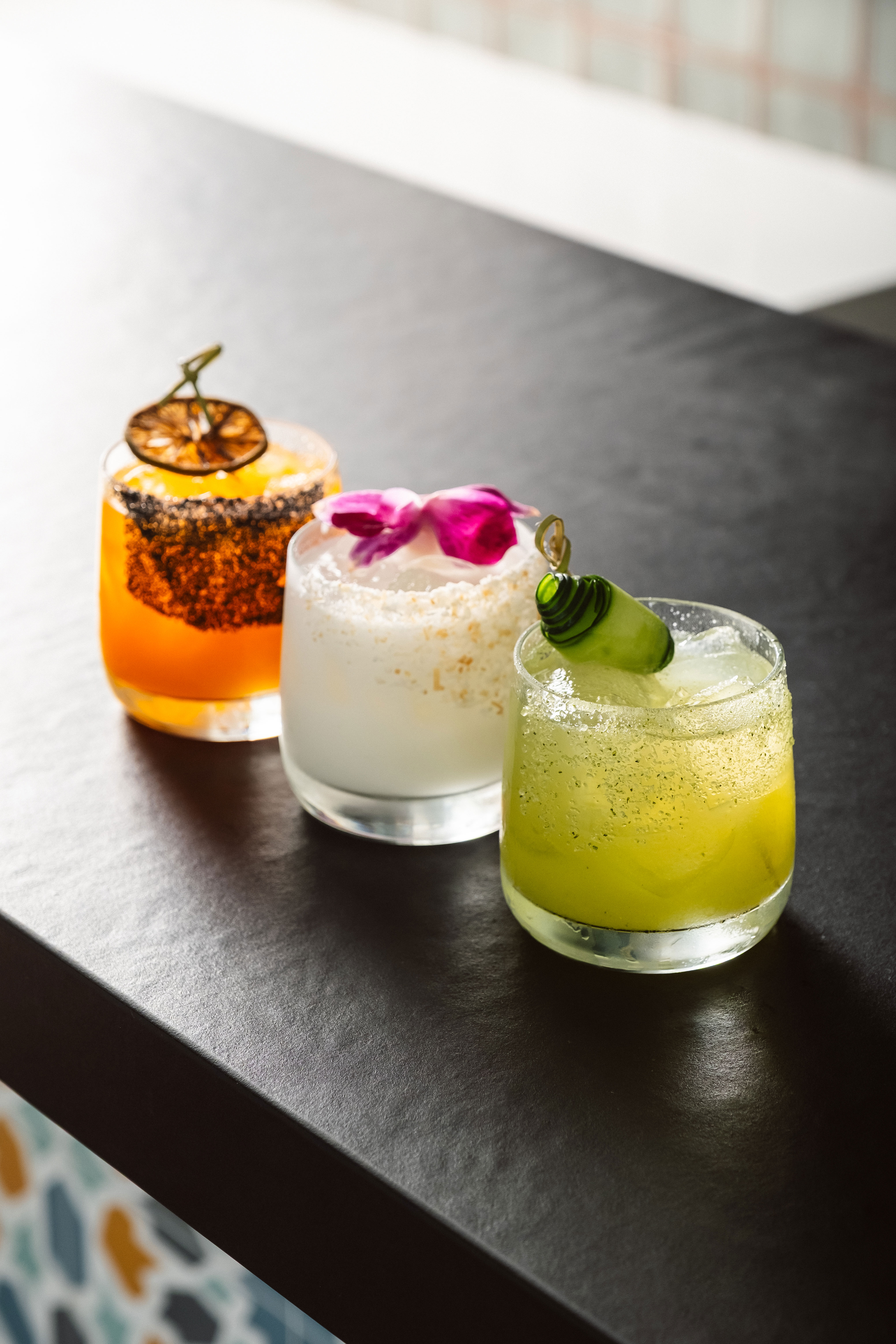 Mia's margarita options. Carrot Passion Margarita, Coconut Margarita, and Aguachile Margarita. 