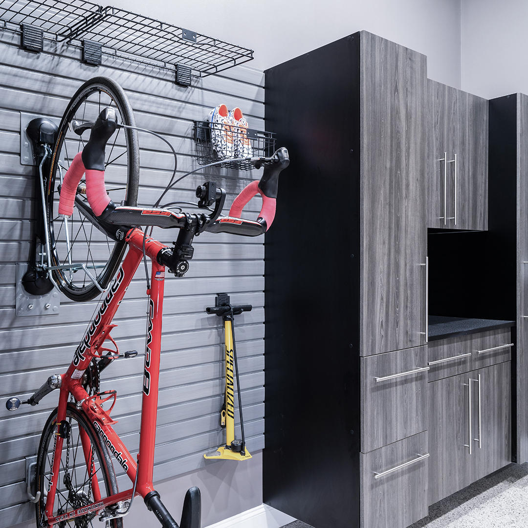 Show us your stuff and we'll find a place for it! Bike Storage, Wall Racks, Hooks, Shelving, Soft-Close Drawers, Overhead Storage, Slatwall-these are all elements of a convenient, functional and beautiful garage. We'll create the space you need for tools, bikes, sporting goods, gardening and more. A