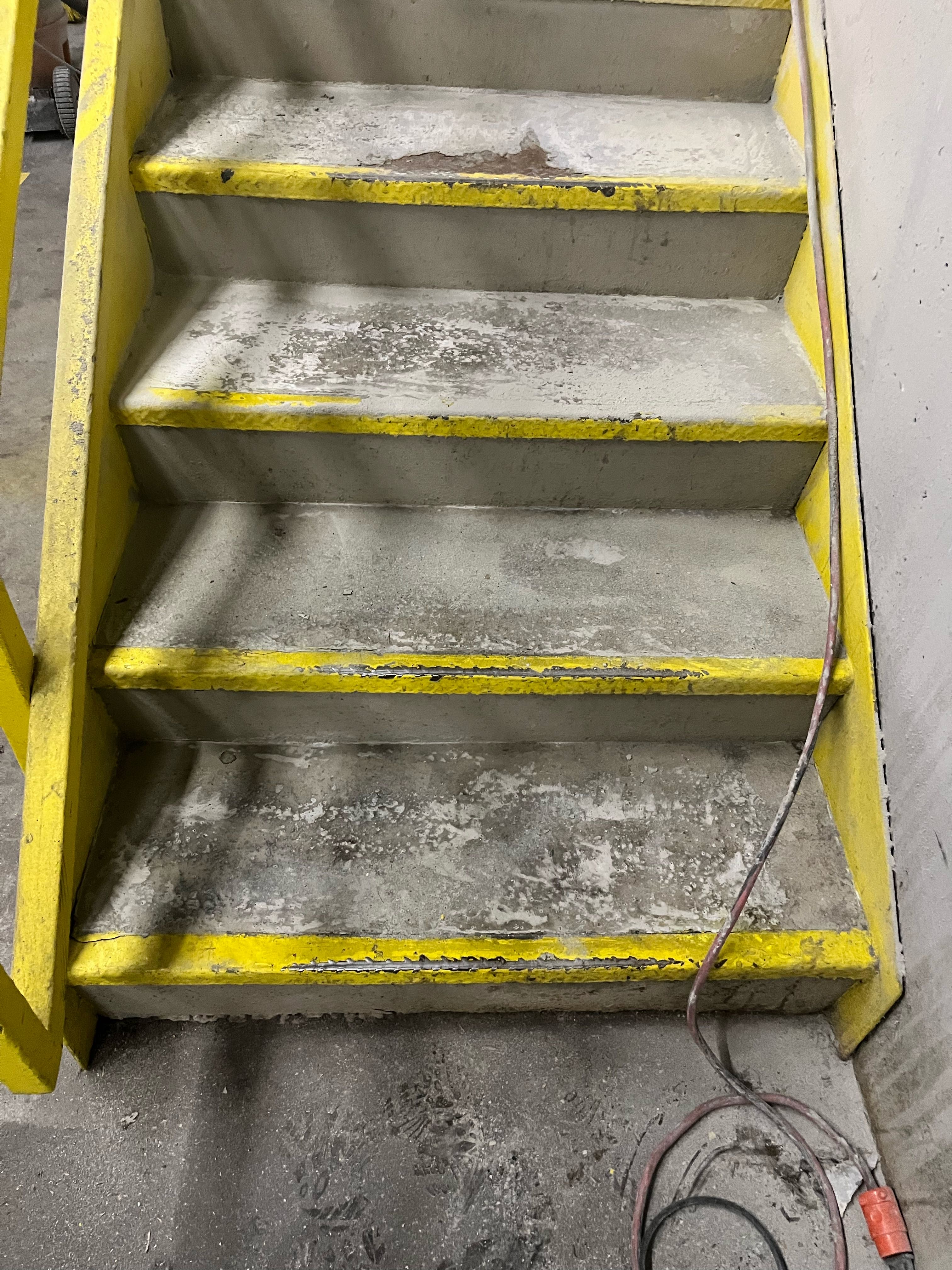 Safety striping on concrete stairs