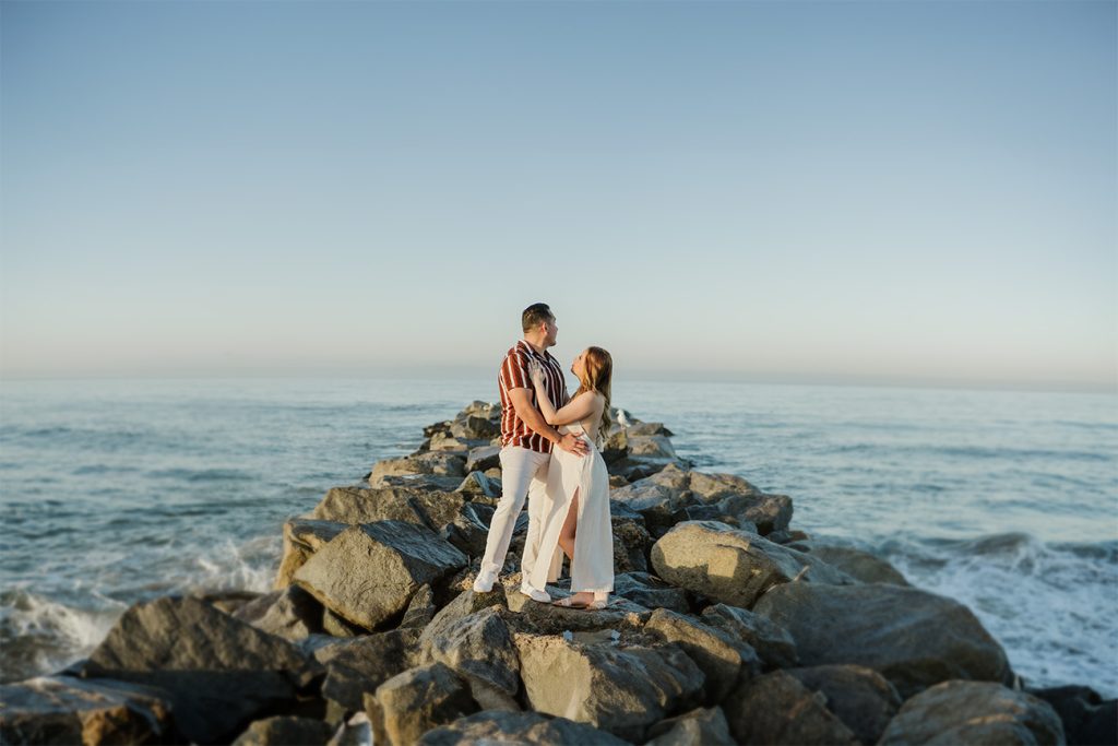 ENGAGEMENT PHOTOGRAPHY. Couples Sunrise Newport Beach Photo Shoot