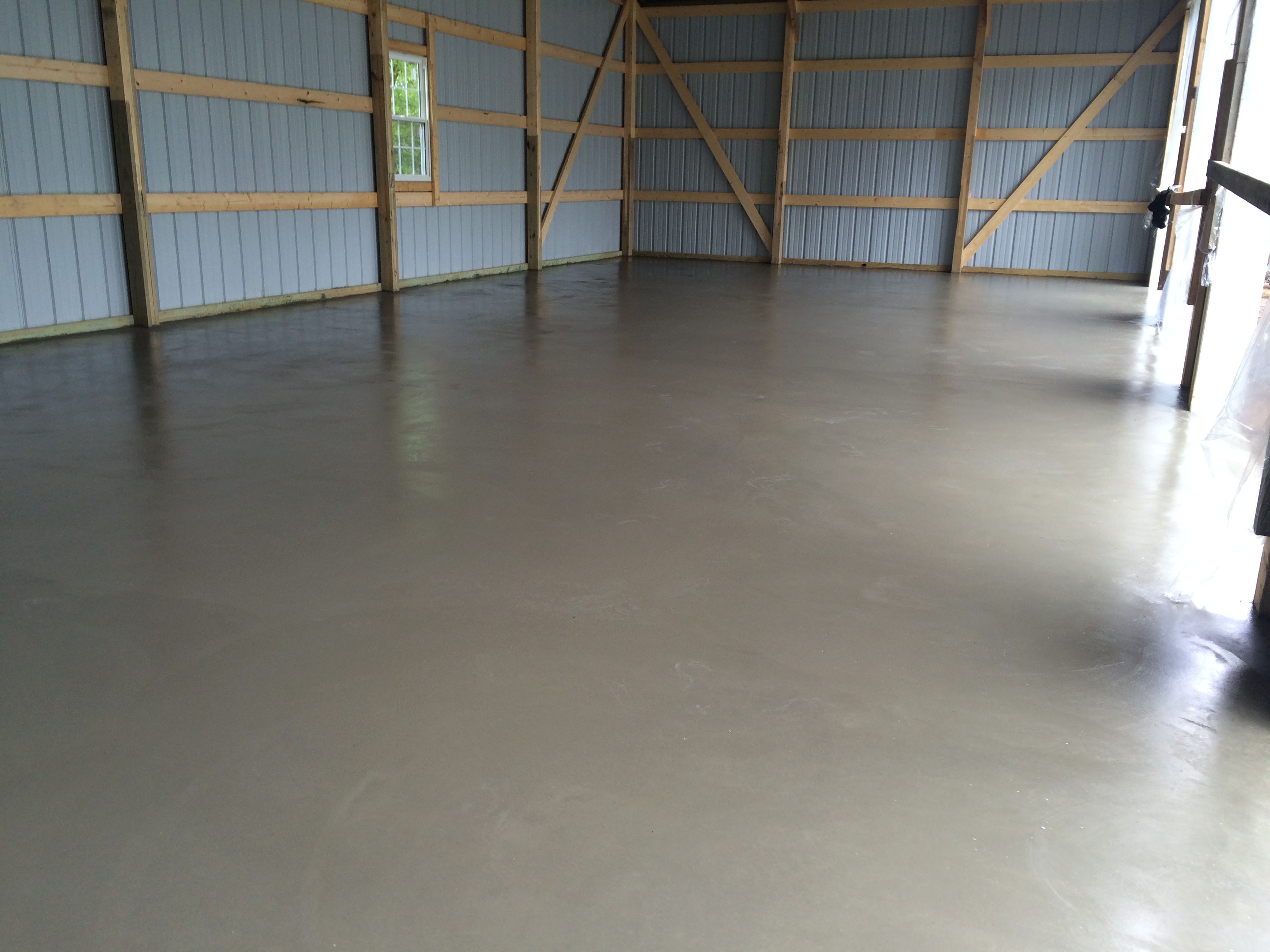 Concrete floor installation for barns and shops. Serving Maple Grove clients.