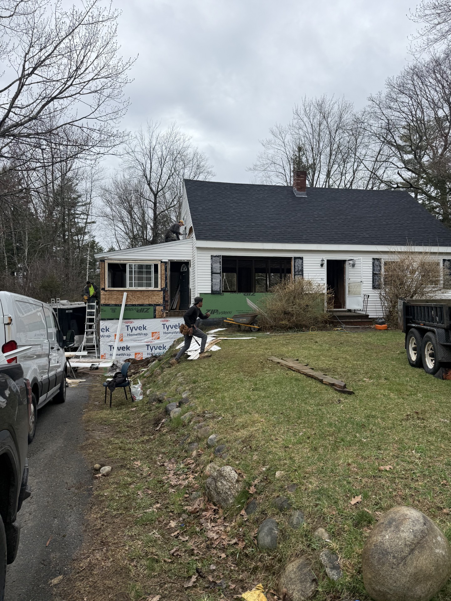 Residential home addition and remodeling project featuring structural expansion and custom construction work completed by M & Son Construction.