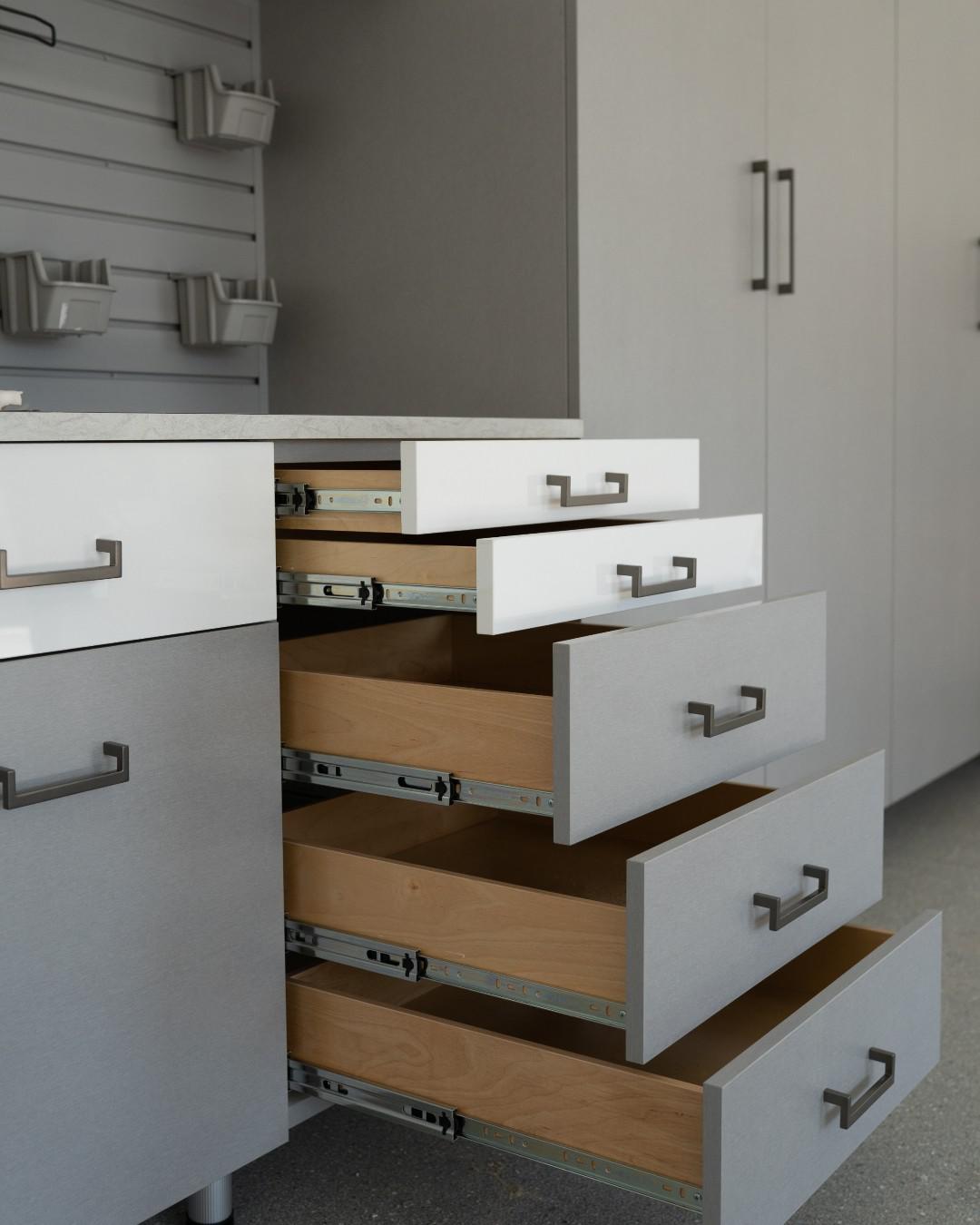 While we are completing our Spring cleaning and saying hello to Summer, we encourage you to consider incorporating sleek drawers and custom handles to your garage space designs. Our team can provide organization options that come in on-trend finishes and styles.